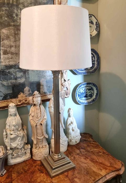English silver plate lamp in the form of a Corinthian column, mounted on a stepped base and marked with a G.S. at the base. The base is weighted with iron